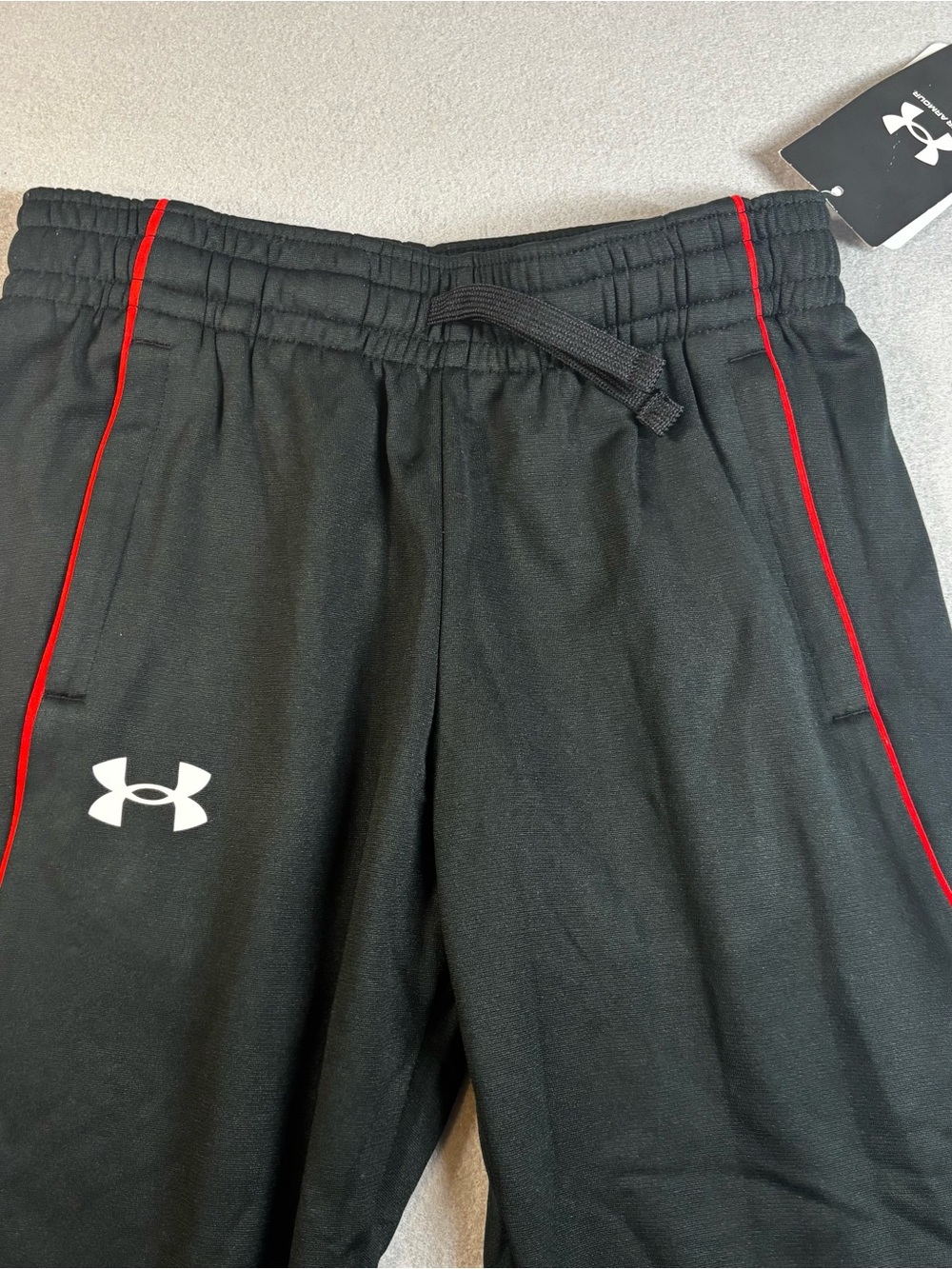 Under Armour Boys Black Athletic Shorts with Red Piping